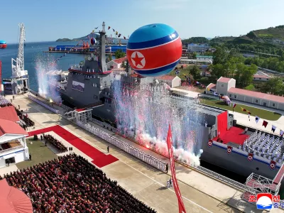 Confetti is released during the launching ceremony of a warship that had been damaged upon its first attempt to launch, in Rajin, North Korea, June 12, 2025 in this photo released by North Korea's official Korean Central News Agency.  KCNA via REUTERS  ATTENTION EDITORS - THIS IMAGE WAS PROVIDED BY A THIRD PARTY. REUTERS IS UNABLE TO INDEPENDENTLY VERIFY THIS IMAGE. NO THIRD PARTY SALES. SOUTH KOREA OUT. NO COMMERCIAL OR EDITORIAL SALES IN SOUTH KOREA.