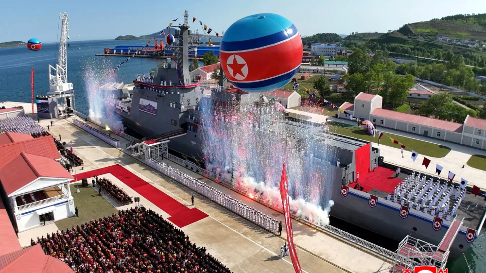 Confetti is released during the launching ceremony of a warship that had been damaged upon its first attempt to launch, in Rajin, North Korea, June 12, 2025 in this photo released by North Korea's official Korean Central News Agency.  KCNA via REUTERS  ATTENTION EDITORS - THIS IMAGE WAS PROVIDED BY A THIRD PARTY. REUTERS IS UNABLE TO INDEPENDENTLY VERIFY THIS IMAGE. NO THIRD PARTY SALES. SOUTH KOREA OUT. NO COMMERCIAL OR EDITORIAL SALES IN SOUTH KOREA.