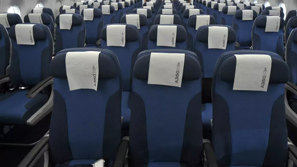 ﻿Rows of seats, installed on board of an Airbus A350 XWB flight-test aircraft, are pictured during a media-day at the German headquarters of aircraft company Airbus in Hamburg-Finkenwerder, April 7, 2014. European planemaker Airbus unveiled on Monday the first cabin for its new mid-sized twin-engined airliner, the A350 XWB, vowing to avoid a repeat of the delays caused by cabin design changes on its bigger A380 super jumbo. REUTERS/Fabian Bimmer (GERMANY - Tags: TRANSPORT TRAVEL)