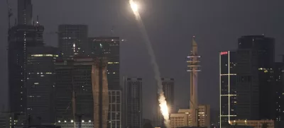 Israeli Iron Dome air defense system fires to intercept projectiles over Tel Aviv, Saturday, June 14, 2025. (AP Photo/Leo Correa)