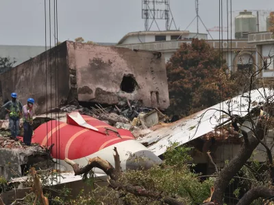 Members of Indian Army's engineering arm prepare to remove the wreckage of an Air India aircraft, bound for London's Gatwick Airport, which crashed during take-off from an airport in Ahmedabad, India June 14, 2025. REUTERS/Amit Dave