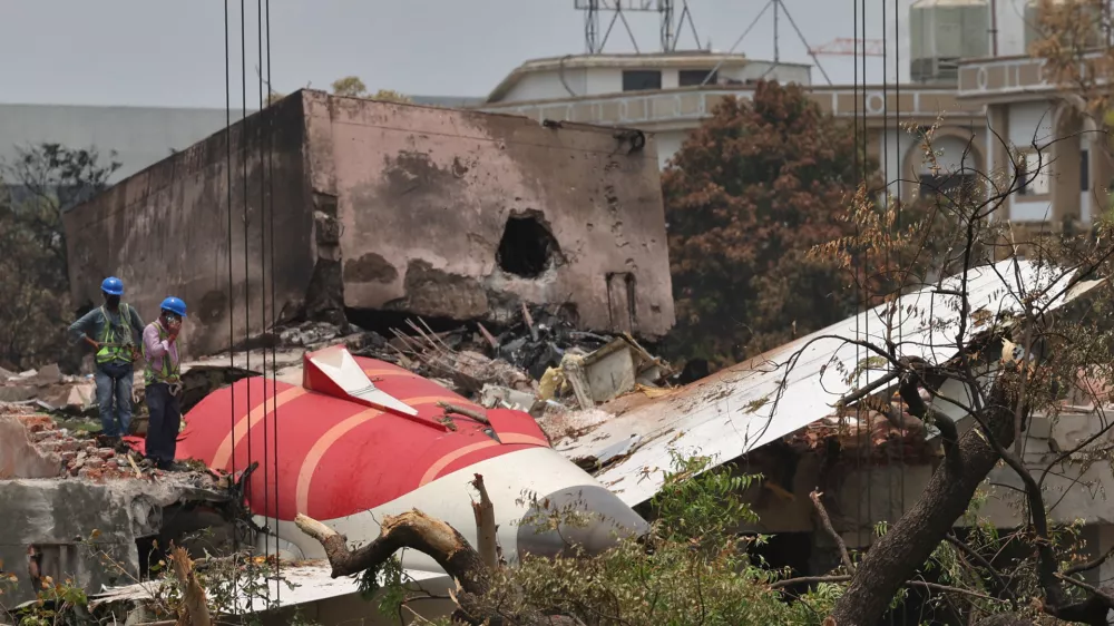 Members of Indian Army's engineering arm prepare to remove the wreckage of an Air India aircraft, bound for London's Gatwick Airport, which crashed during take-off from an airport in Ahmedabad, India June 14, 2025. REUTERS/Amit Dave