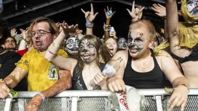 Festivalgoers are seen during the Bonnaroo Music & Arts Festival on Thursday, June 12, 2025, in Manchester, Tenn. (Photo by Amy Harris/Invision/AP)
