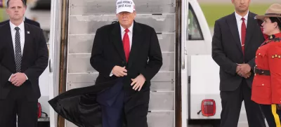 President Donald Trump arrives on Air Force One at Calgary International Airport, Sunday, June 15, 2025, in Calgary, Canada, ahead of the G7 Summit. (AP Photo/Gerald Herbert)