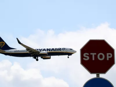 ﻿A Ryanair airplane passes a Stop sign as it lands at Barcelona-El Prat airport, the day before a cabin crew strike is to be held in European countries, in Barcelona, Spain, July 24, 2018. REUTERS/Albert Gea
