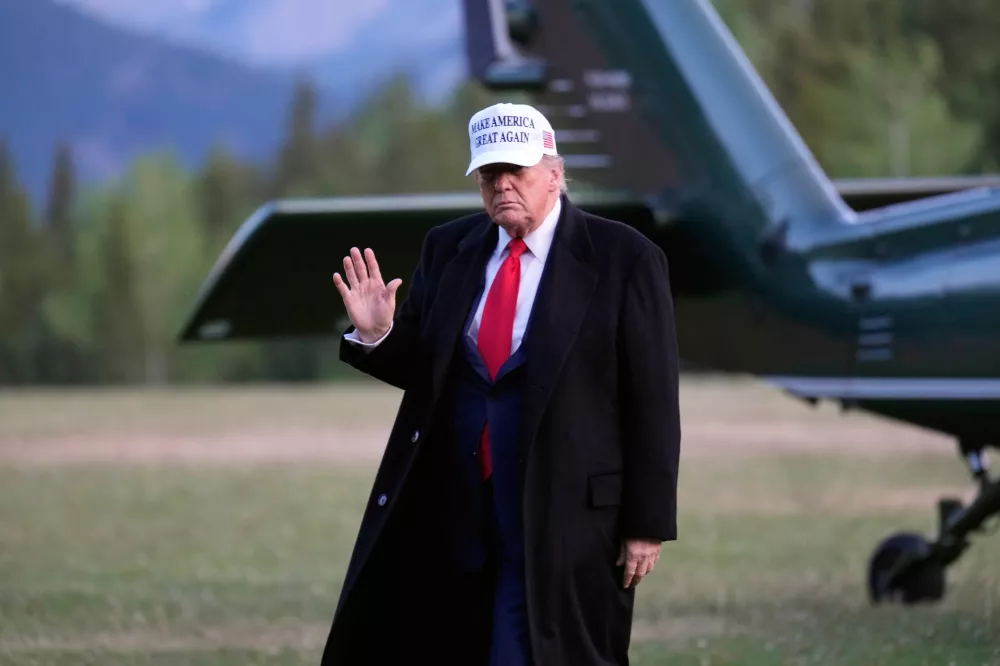 U.S. President Donald Trump arrives at the G7 Summit in Kananaskis, Alberta, Sunday, June 15, 2025. (Adrian Wyld/The Canadian Press via AP)