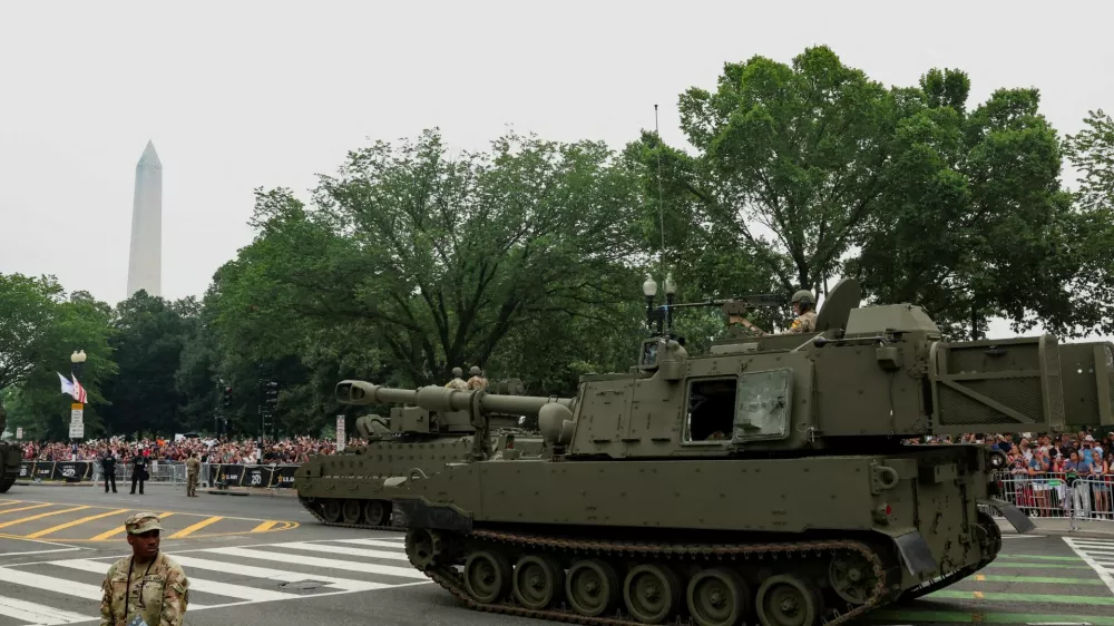 A Paladin self-propelled howitzer passes during a military parade to commemorate the U.S. Army's 250th Birthday in Washington, D.C., U.S., June 14, 2025. REUTERS/Kevin Mohatt REFILE - CORRECTING NAME OF THE MILITARY VEHICLE FROM "M1A2/ABRAMS TANK" TO "PALADIN SELF-PROPELLED HOWITZER".