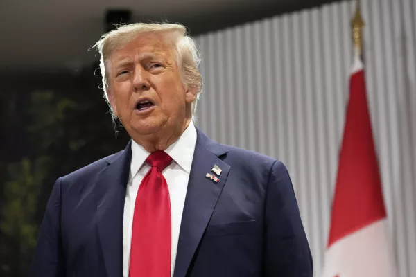President Donald Trump speaks during a meeting with Canada's Prime Minister Mark Carney on the sidelines of the G7 Summit, Monday, June 16, 2025, in Kananaskis, Canada. (AP Photo/Mark Schiefelbein)