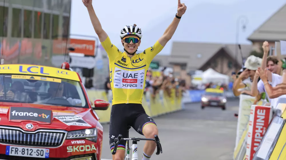 14 June 2025, France, Mont-Cenis: Slovenian cyclist Tadej Pogacar of UAE Team Emirates XRG celebrates winning the 8th and final stage of the 77th edition of the Criterium du Dauphine cycling race, 133.3 km from Val-d'Arc-Val-Cenis to Plateau du Mont Cenis. Photo: Stefano Cavasino/LiveMedia-IPA/ZUMA Press Wire/dpa
