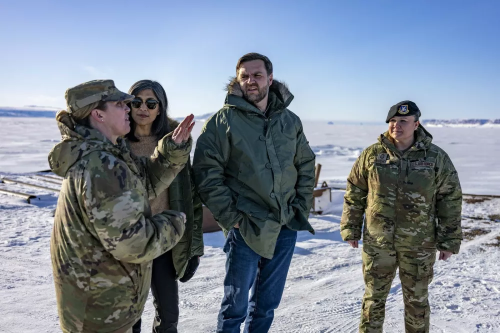 (FILES) US Vice President JD Vance (2R) and Second Lady Usha Vance (2L) listen to Col. Susan Meyers (L), commander of the US military's Pituffik Space Base, as they tour base in Greenland on March 28, 2025. Col. Susannah Meyers, commander of the US military's Pituffik Space Base, was removed from command on April 10, 2025, according to a statement released by the Space Operations Command.,Image: 986267032, License: Rights-managed, Restrictions:, Model Release: no