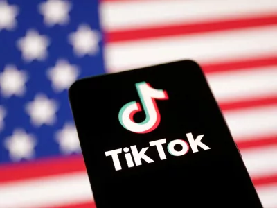 FILE PHOTO: U.S. flag and TikTok logo are seen in this illustration taken January 8, 2025. REUTERS/Dado Ruvic/Illustration/File Photo