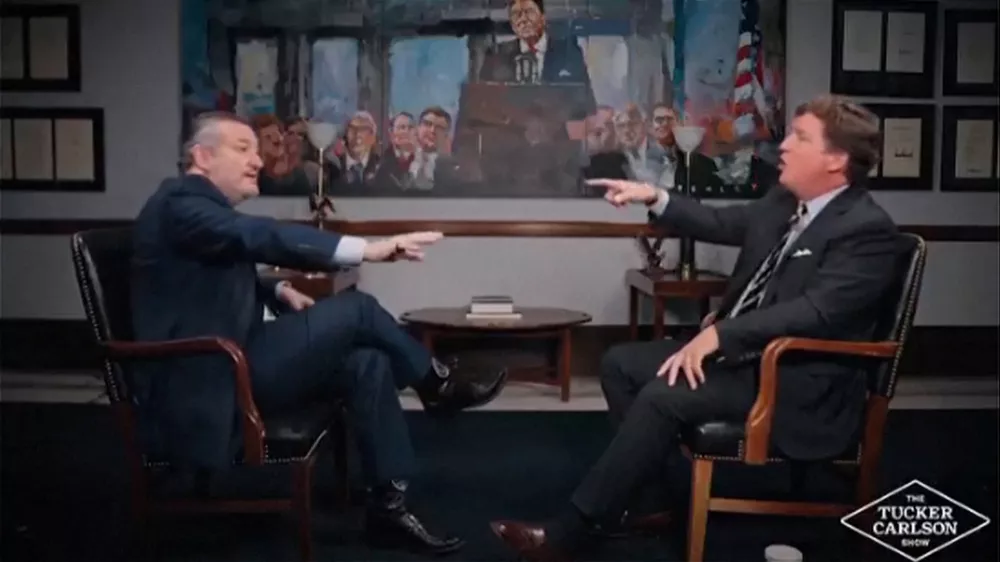 Conservative podcast host and commentator Tucker Carlson engages in an exchange with U.S. Senator Ted Cruz of Texas on the subject of the United States' involvement in the conflict between Israel and Iran, in a still image from video released June 17, 2025. Tucker Carlson Network/Handout via REUTERS    NO RESALES. NO ARCHIVES. THIS IMAGE HAS BEEN SUPPLIED BY A THIRD PARTY MANDATORY CREDIT