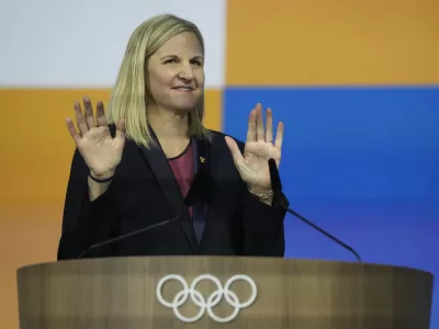 Kirsty Coventry gestures as she speaks after she was announced as the new IOC President at the International Olympic Committee 144th session in Costa Navarino, western Greece, Thursday, March 20, 2025. (AP Photo/Thanassis Stavrakis)