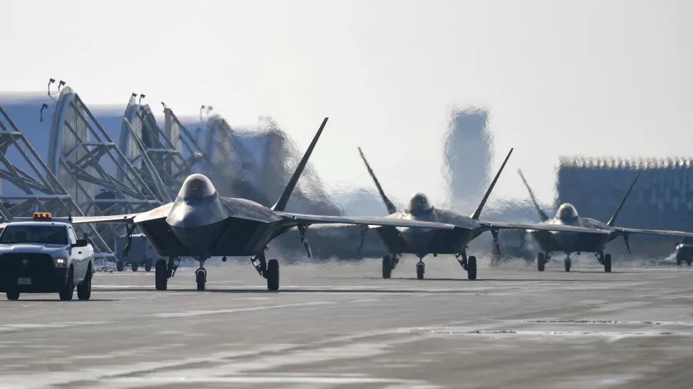 FILE PHOTO: U.S. Air Force F-22 fighter jets take part in a joint drill with South Korea's Air Force at Kunsan air base, in Gunsan, South Korea, December 20, 2022. The Defence Ministry/Handout via REUTERS/File Photo