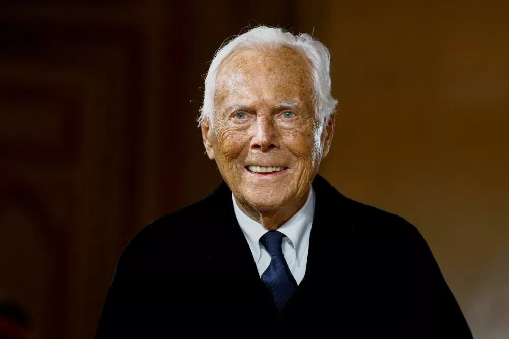 FILE PHOTO: Designer Giorgio Armani appears at the end of his Haute Couture Spring/Summer 2025 collection show for Giorgio Armani Prive in Paris, France, January 28, 2025. REUTERS/Sarah Meyssonnier/File Photo