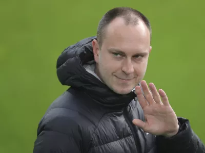 FILE - The then head coach of Kiel, Ole Werner, waves ahead of the German Soccer Cup semifinal match between Borussia Dortmund and Holstein Kiel in Dortmund, Germany, Saturday, May 1, 2021. (Friedemann Vogel/Pool via AP, File)