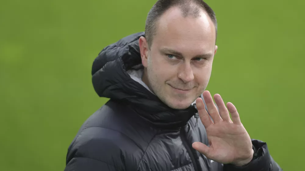FILE - The then head coach of Kiel, Ole Werner, waves ahead of the German Soccer Cup semifinal match between Borussia Dortmund and Holstein Kiel in Dortmund, Germany, Saturday, May 1, 2021. (Friedemann Vogel/Pool via AP, File)