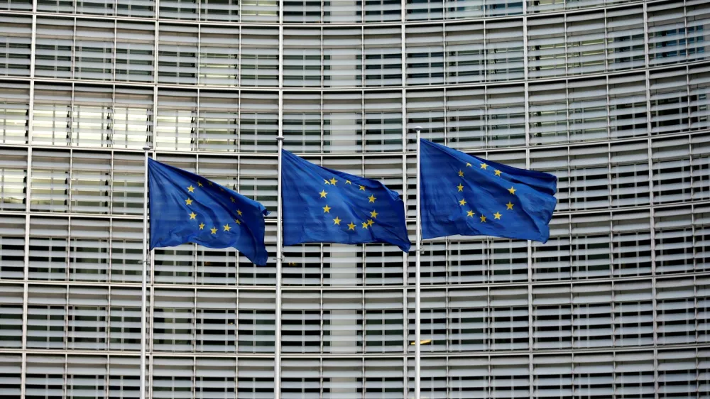 FILE PHOTO: European Union flags flutter outside the EU Commission headquarters in Brussels, Belgium, January 18, 2018. REUTERS/Francois Lenoir/File Photo