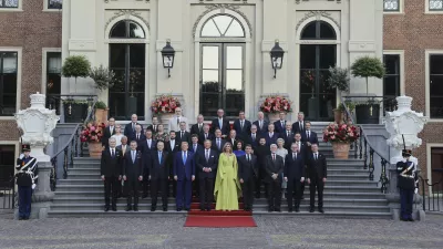 NATO heads of state and government pose for a group photo prior to a formal dinner at the Paleis Huis ten Bosch on the sidelines of the NATO summit in The Hague, Netherlands, Tuesday, June 24, 2025. (Christian Hartmann, Pool Photo via AP)
