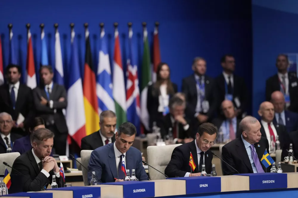 From left, Slovenia's Prime Minister Robert Golob, Spain's Prime Minister Pedro Sanchez, Sweden's Prime Minister Ulf Kristersson and Turkish President Recep Tayyip Erdogan attend a plenary session at the NATO summit in The Hague, Netherlands, Wednesday, June 25, 2025. (AP Photo/Matthias Schrader)