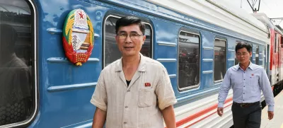 RUSSIA, MOSCOW - JUNE 25, 2025: Employees of the Korean State Railway are seen as the Pyongyang - Moscow passenger train arrives at the Yaroslavsky railway station. The train service between Pyongyang and Moscow has resumed after a five-year suspension due to the COVID-19 pandemic,Image: 1014894016, License: Rights-managed, Restrictions: * Switzerland And Russia Rights Out *, Model Release: no