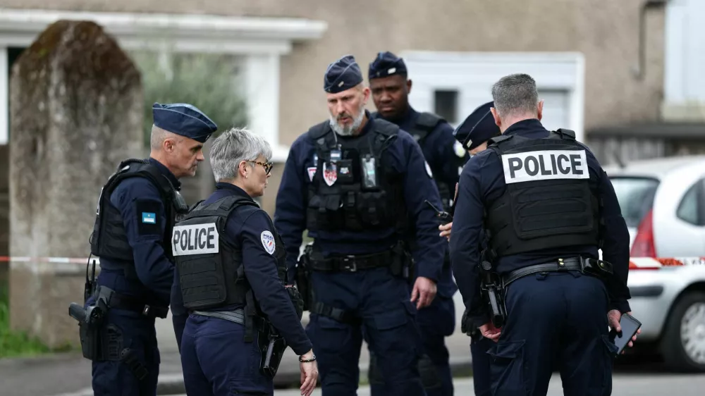 French police secure the area near the Notre-Dame-de-Toutes-Aides high school after one student was killed and other students injured in a school stabbing, in Nantes, France, April 24, 2025. REUTERS/Stephane Mahe