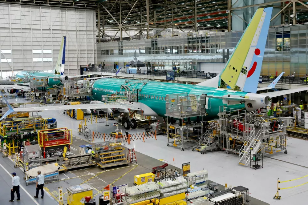FILE PHOTO: Boeing 737 MAX aircraft are assembled at the company's plant in Renton, Washington, U.S. June 25, 2024. Jennifer Buchanan/Pool via REUTERS/File Photo