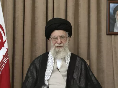 In this photo released on Thursday, June 26, 2025, by the official website of the office of the Iranian supreme leader, Supreme Leader Ayatollah Ali Khamenei speaks in a televised speech, under a portrait of the late revolutionary founder Ayatollah Khomeini. (Office of the Iranian Supreme Leader via AP)