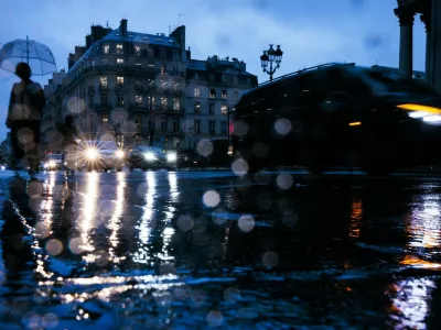 A pedestrian walks down a flooded street following heavy rainfall which has been placed on orange alert Paris and and part of Ile-de-France for rain and flooding and on red alert six other departments, in Paris, on October 17, 202.,Image: 922550887, License: Rights-managed, Restrictions:, Model Release: noFoto: Profimedia