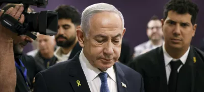 FILE - Israeli Prime Minister Benjamin Netanyahu attends his trial where he faces corruption charges at the district court in Tel Aviv, Israel, Dec. 16, 2024. (Stoyan Nenov/Pool Photo via AP, File)