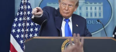 President Donald Trump points to a reporter to take a question as he speaks to the media, Friday, June 27, 2025, in the briefing room of the White House in Washington. (AP Photo/Jacquelyn Martin)