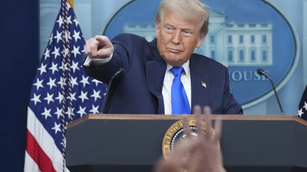 President Donald Trump points to a reporter to take a question as he speaks to the media, Friday, June 27, 2025, in the briefing room of the White House in Washington. (AP Photo/Jacquelyn Martin)