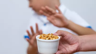 ﻿Peanut food allergy concept. Great concept of allergy and skin diseases. Nut allergies. No peanuts. Food allergy symptoms, Irritation