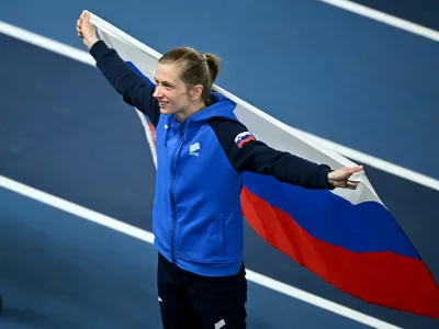 Athletics - World Athletics Indoor Championships - Nanjing Youth Olympic Sports Park, Nanjing, China - March 22, 2025 Slovenia's Tina Sutej celebrates after finishing second in the women's pole vault final REUTERS/Dylan Martinez