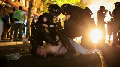 Law enforcement officers detain a demonstrator, during an anti-government protest demanding snap elections, in Belgrade, Serbia, June 28, 2025. REUTERS/Marko Djurica