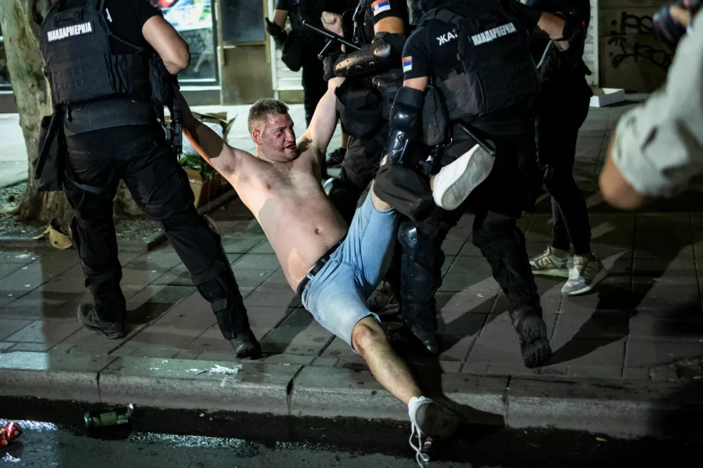 Law enforcement officers detain a demonstrator during an anti-government protest demanding snap elections, in Belgrade, Serbia, June 28, 2025. REUTERS/Marko Djurica