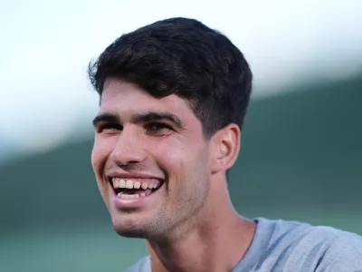 28 June 2025, United Kingdom, London: Spanish tennis player Carlos Alcaraz speaks to the media at the All England Lawn Tennis and Croquet Club in Wimbledon ahead of the Wimbledon Championships. Photo: John Walton/PA Wire/dpa