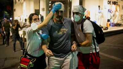 An injured demonstrator is helped during an anti-government protest demanding snap elections, in Belgrade, Serbia, June 28, 2025. REUTERS/Marko Djurica