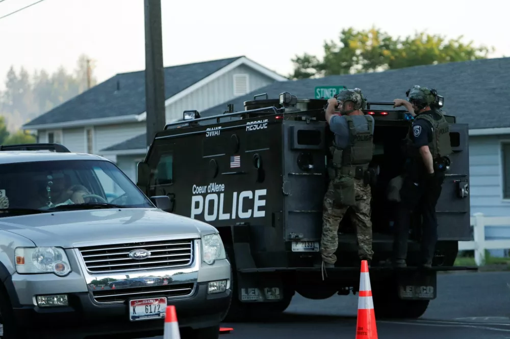 An armored police vehicle leaves an area where multiple firefighters were attacked when responding to a fire in the Canfield Mountain area outside Coeur d'Alene, Idaho, U.S. June 29, 2025. REUTERS/Young Kwak