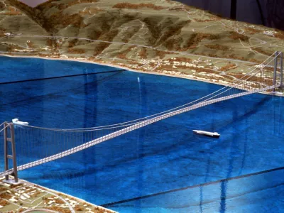 An undated file photo of a plastic model of what is to be the world's longest suspension bridge, a mega-span linking the Italian mainland to the island of Sicily across the torrid straits of Messina. Italy will announce on October 12, 2005 the winner of the contract to build the world's largest suspension bridge, a 4.4 billion euro (.3 billion) project linking the island of Sicily to the Italian mainland. The Messina Bridge project has been on the drawing board for nearly 40 years but has been snarled by problems ranging from bickering among planners to allegations of Mafia involvement. REUTERS/Tony Gentile