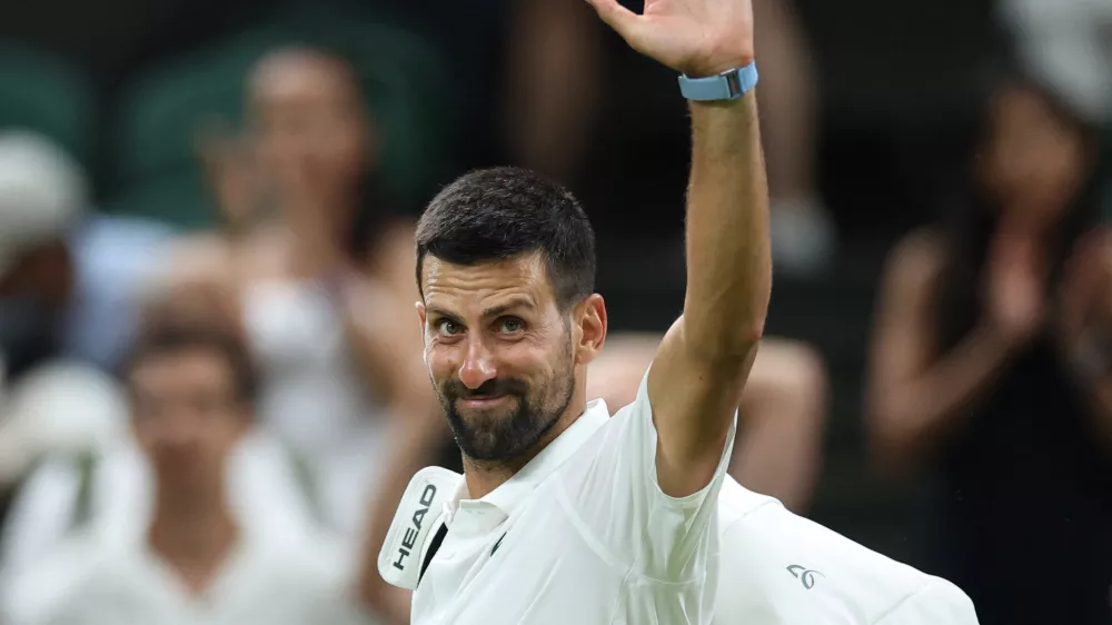 Tennis - Wimbledon - All England Lawn Tennis and Croquet Club, London, Britain - July 1, 2025 Serbia's Novak Djokovic leaves the court after winning his first round match against France's Alexandre Muller REUTERS/Toby Melville