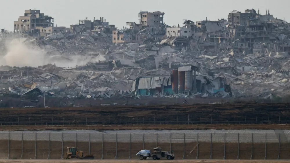 An Israeli military vehicle manoeuvres near the Israel-Gaza border, as seen from Israel, July 1, 2025. REUTERS/Amir Cohen