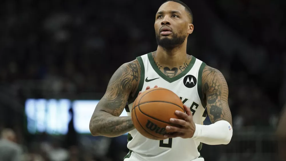 FILE - Milwaukee Bucks' Damian Lillard shoots a free throw during the second half of an NBA basketball game against the Orlando Magic, March 8, 2025, in Milwaukee. (AP Photo/Aaron Gash, File)