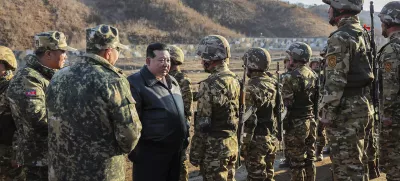 FILE - In this photo provided by the North Korean government, North Korean leader Kim Jong Un, center left, meets soldiers during a visit to a western operational training base in North Korea Wednesday, March 6, 2024. Independent journalists were not given access to cover the event depicted in this image distributed by the North Korean government. The content of this image is as provided and cannot be independently verified. Korean language watermark on image as provided by source reads: "KCNA" which is the abbreviation for Korean Central News Agency. (Korean Central News Agency/Korea News Service via AP, File)
