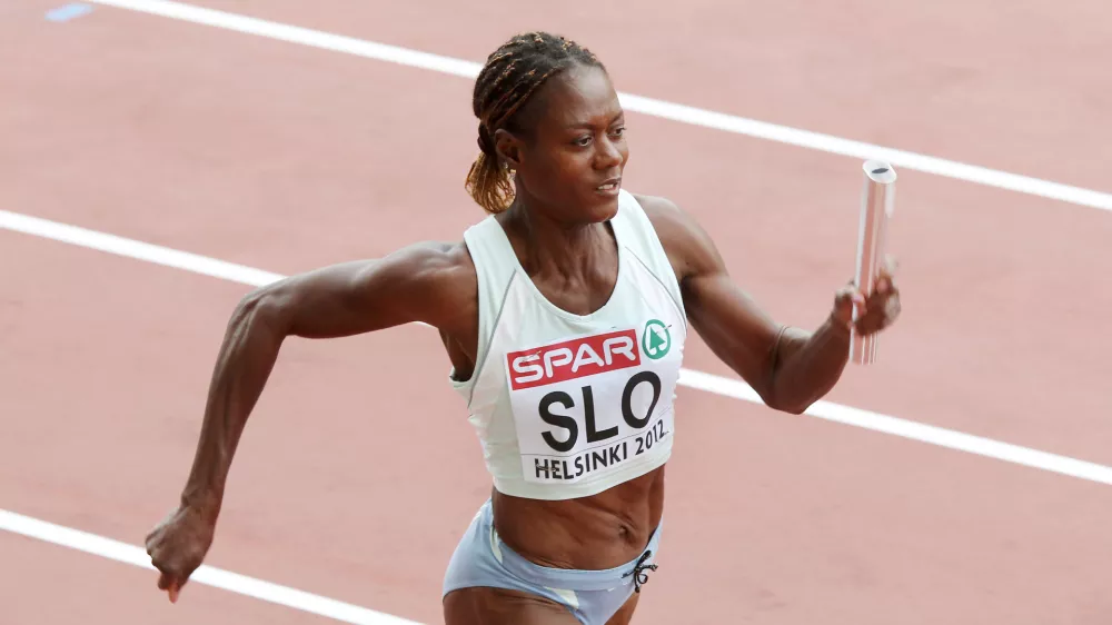 52 year-old Jamaican-born Merlene Ottey runs for Slovenia in the Women's 4x100 meter Relay heat at the European Athletics Championships in Helsinki, Finland, Saturday, June 30, 2012. (AP Photo/Michael Probst) / Foto: Michael Probst