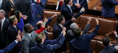 Members of the U.S. House of Representatives react after the U.S. President Donald Trump's sweeping spending and tax bill passes, on Capitol Hill in Washington, D.C., U.S., July 3, 2025. REUTERS/Umit Bektas