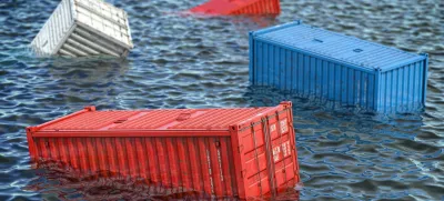 Shipping cargo container lost in the sea or ocean. Cargo isurance concept. 3d illustration Getty Images/iStockphoto