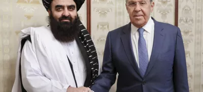 FILE - In this photo released by Russian Foreign Ministry Press Service on Oct. 4, 2024, Russian Foreign Minister Sergey Lavrov, right, and Acting Foreign Minister of Afghanistan's Taliban movement Amir Khan Muttaqi pose for a photo prior to their talks in Moscow, Russia. (Russian Foreign Ministry Press Service via AP, File)