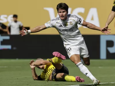Real Madrid's Fran Garcia celebrates after scoring his side's second goal against Borussia Dortmund during the Club World Cup quarterfinal soccer match between Real Madrid and Borussia Dortmund in East Rutherford, N.J., Saturday, July 5, 2025. (AP Photo/Adam Hunger)