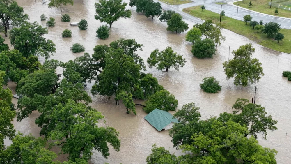 A drone view shows an area flooded by the swollen San Gabriel river, in Georgetown, Texas, U.S. July 5, 2025 in this screen grab from social media video. Adam Grumbo/via REUTERS THIS IMAGE HAS BEEN SUPPLIED BY A THIRD PARTY. MANDATORY CREDIT. NO RESALES. NO ARCHIVES.